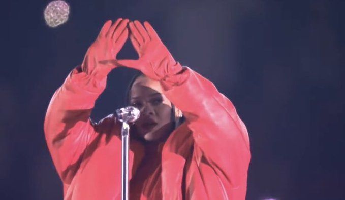 Rihanna's Cryptic Hand Symbol Sparks Conspiracy Theories After Viral Super  Bowl Video