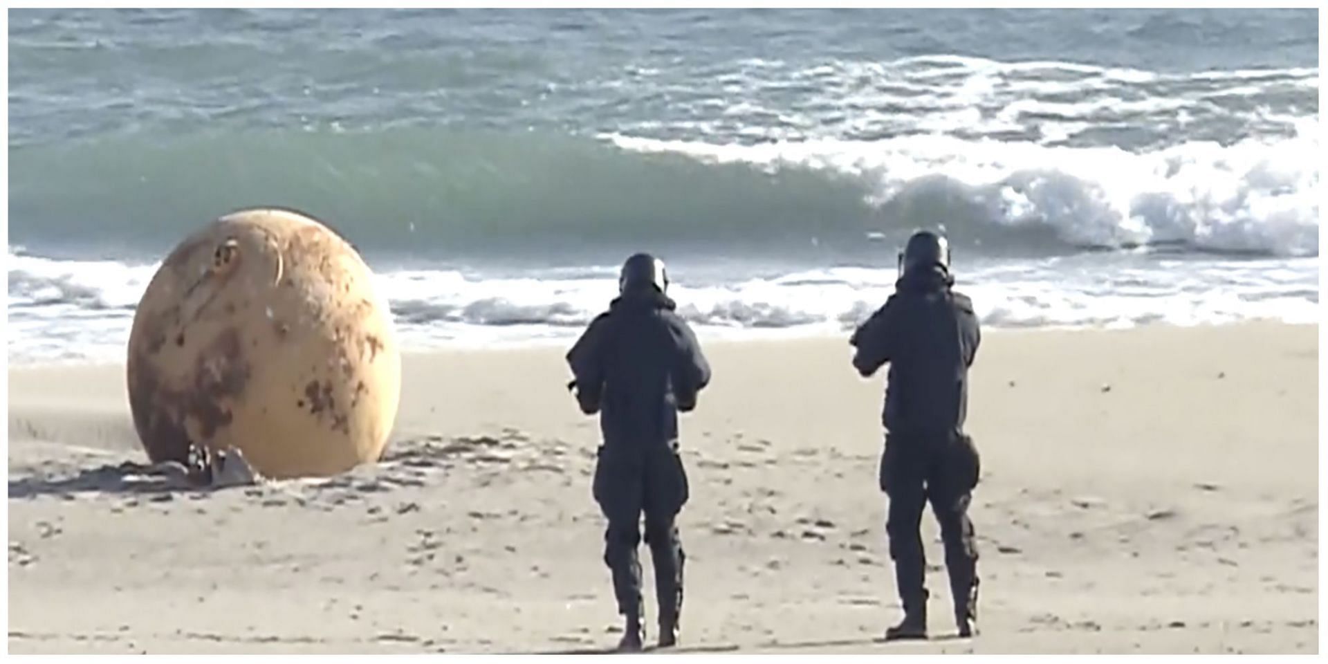 Japan is startled over the ball-like unidentified object that showed up near the shore out of nowhere: More details revealed. (Image via Reuters)