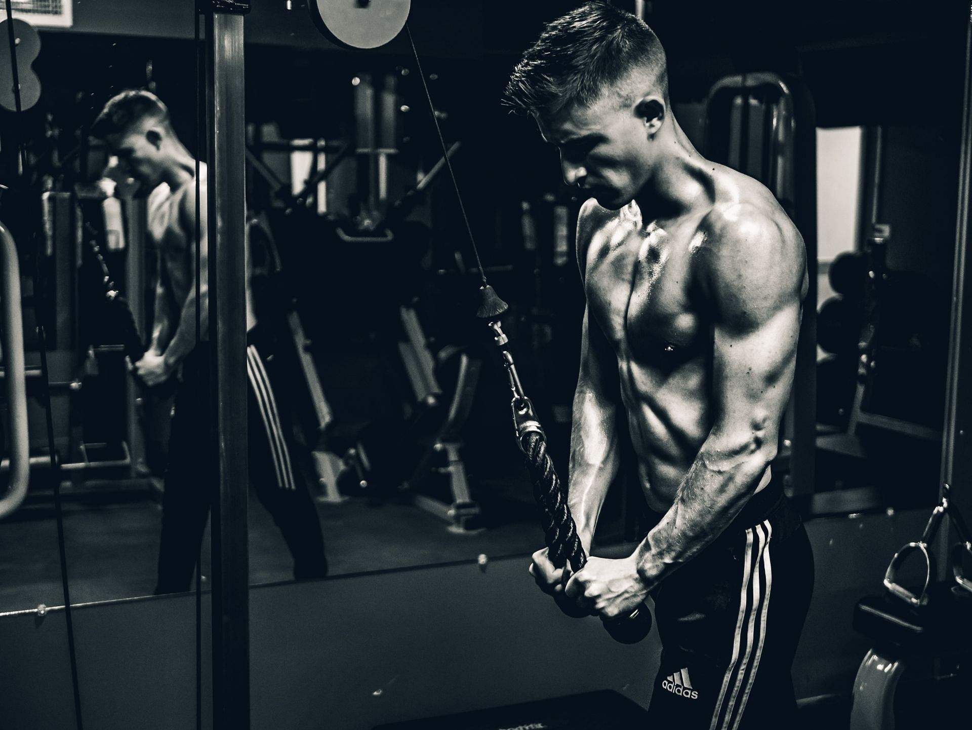 Cable tricep extension is the best exercise to get stronger triceps. (Image via Unsplash/ Daniel Apodaca)