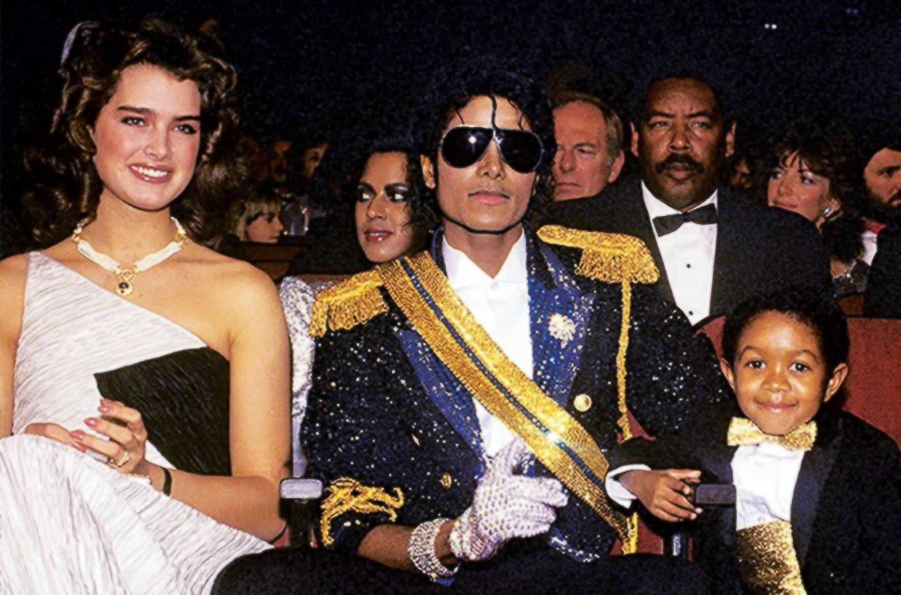 Brooke Shields, Michael Jackson, and Emmanuel Lewis at the 1984 Grammy Awards (Image via Polaris)
