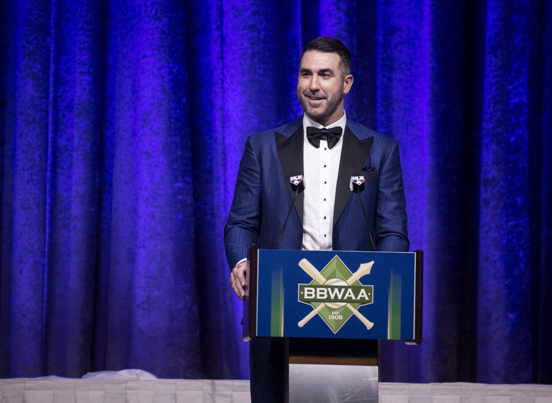 Justin Verlander receives the American League Cy Young Award during the 2023 Baseball Writers&#039; Association of America awards dinner.