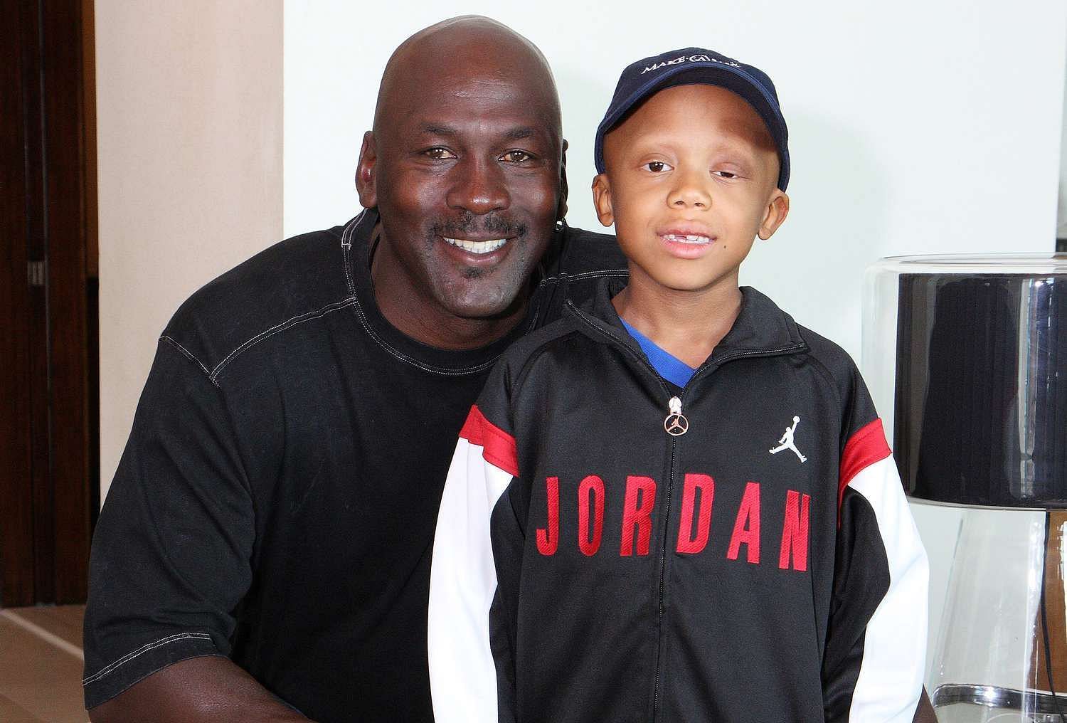 Michael Jordan granting a wish for Make-A-Wish Foundation. (Photo: People Magazine)