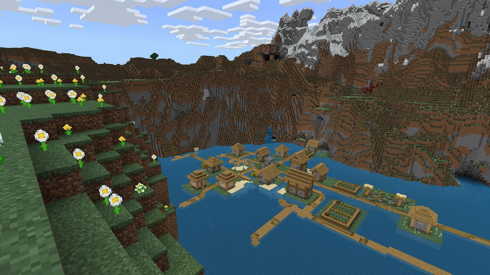 This Minecraft seed drops players right next to a particularly tranquil village (Image via Mojang)