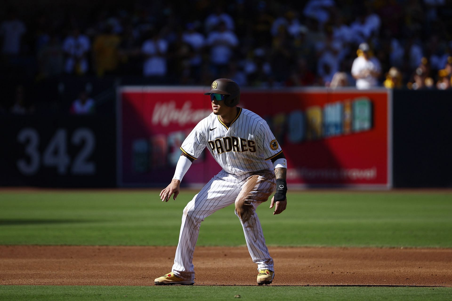 Manny Machado of the San Diego Padres takes a lead off second base.