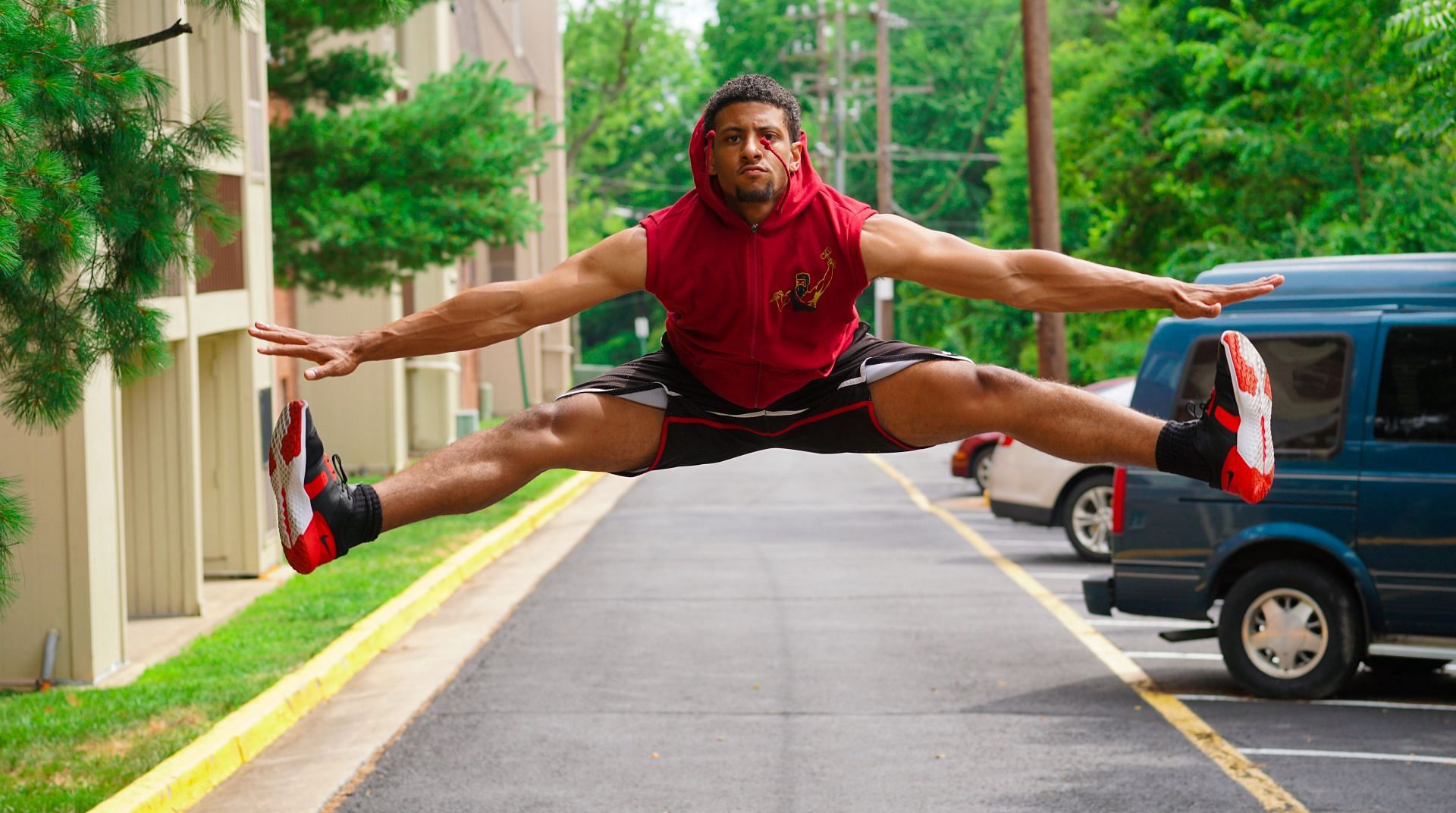 A boy jumping high in the air (Image via Pexels/Justin Shaifer)