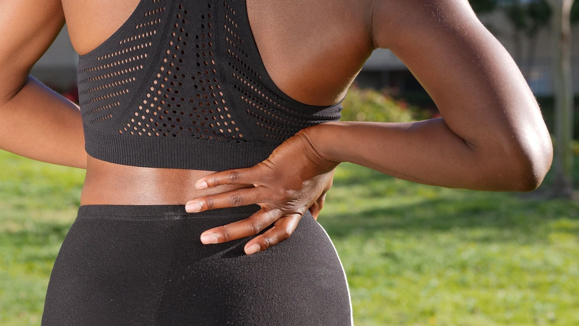 Lower back pain can be a symptom of anterior pelvic issues. (Photo via Pexels/Kindel Media)