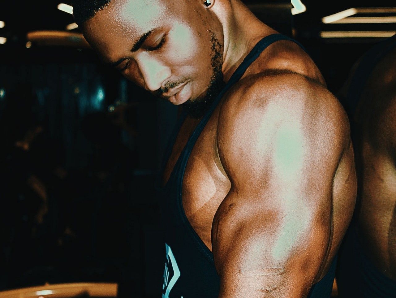 Triceps and shoulders (Photo via josef pascal/Pexels