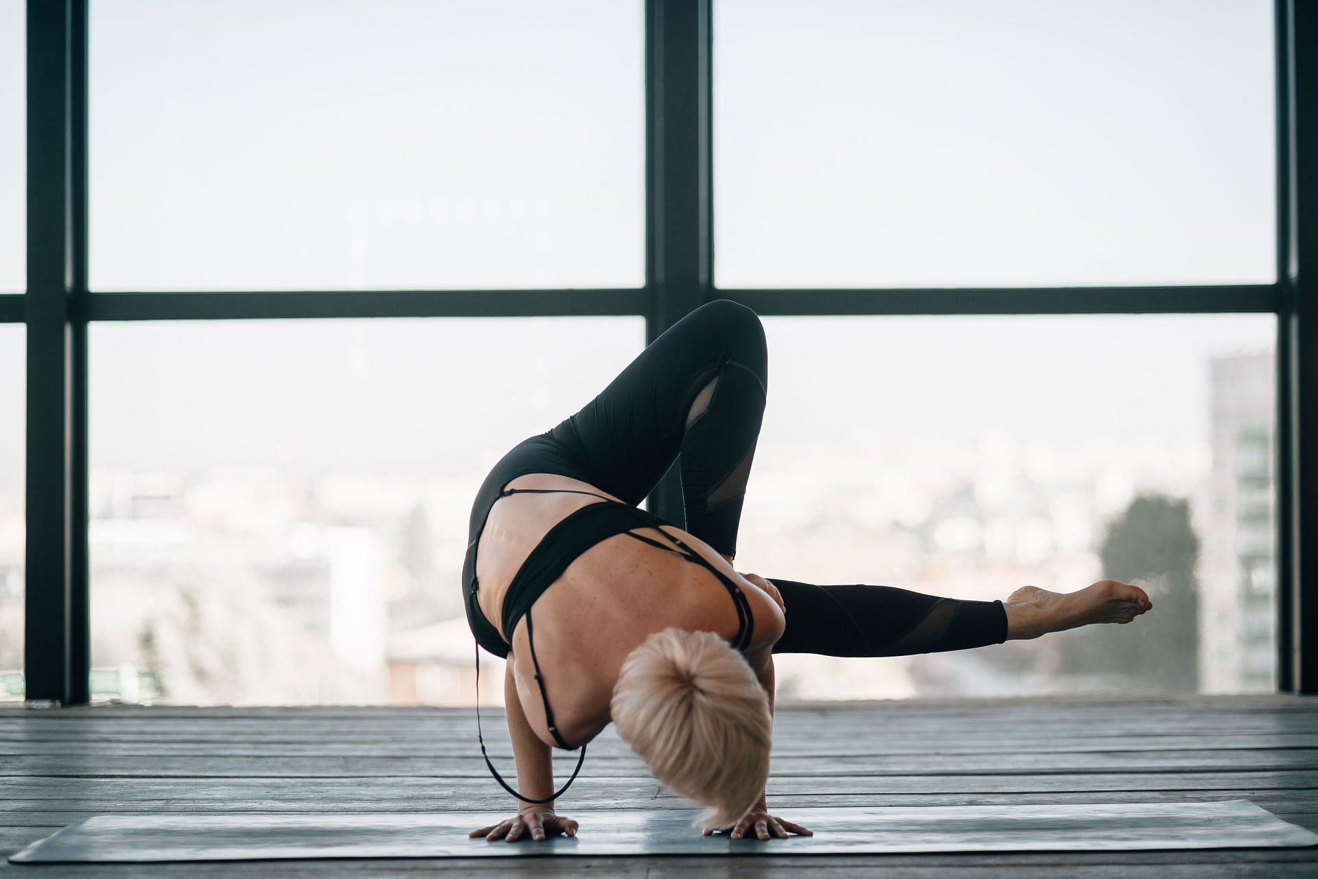 All you need is a mat for at-home pilates (Image via Unsplash/Dmitriy Frantsev)