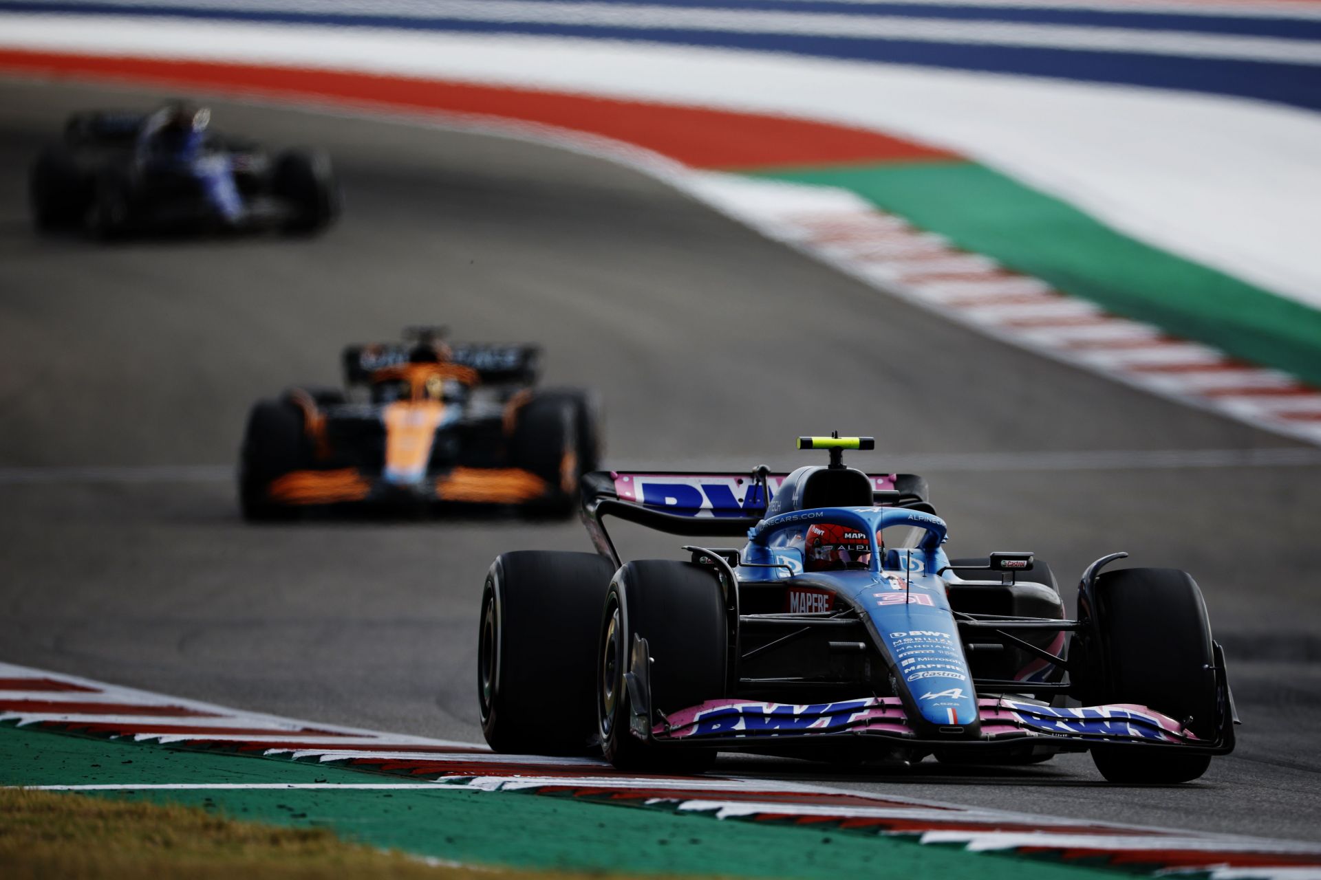 Esteban Ocon of France driving the (31) Alpine F1 A522 Renault leads Daniel Ricciardo of Australia driving the (3) McLaren MCL36 Mercedes on track during the F1 Grand Prix of USA at Circuit of The Americas on October 23, 2022, in Austin, Texas. (Photo by Jared C. Tilton/Getty Images)