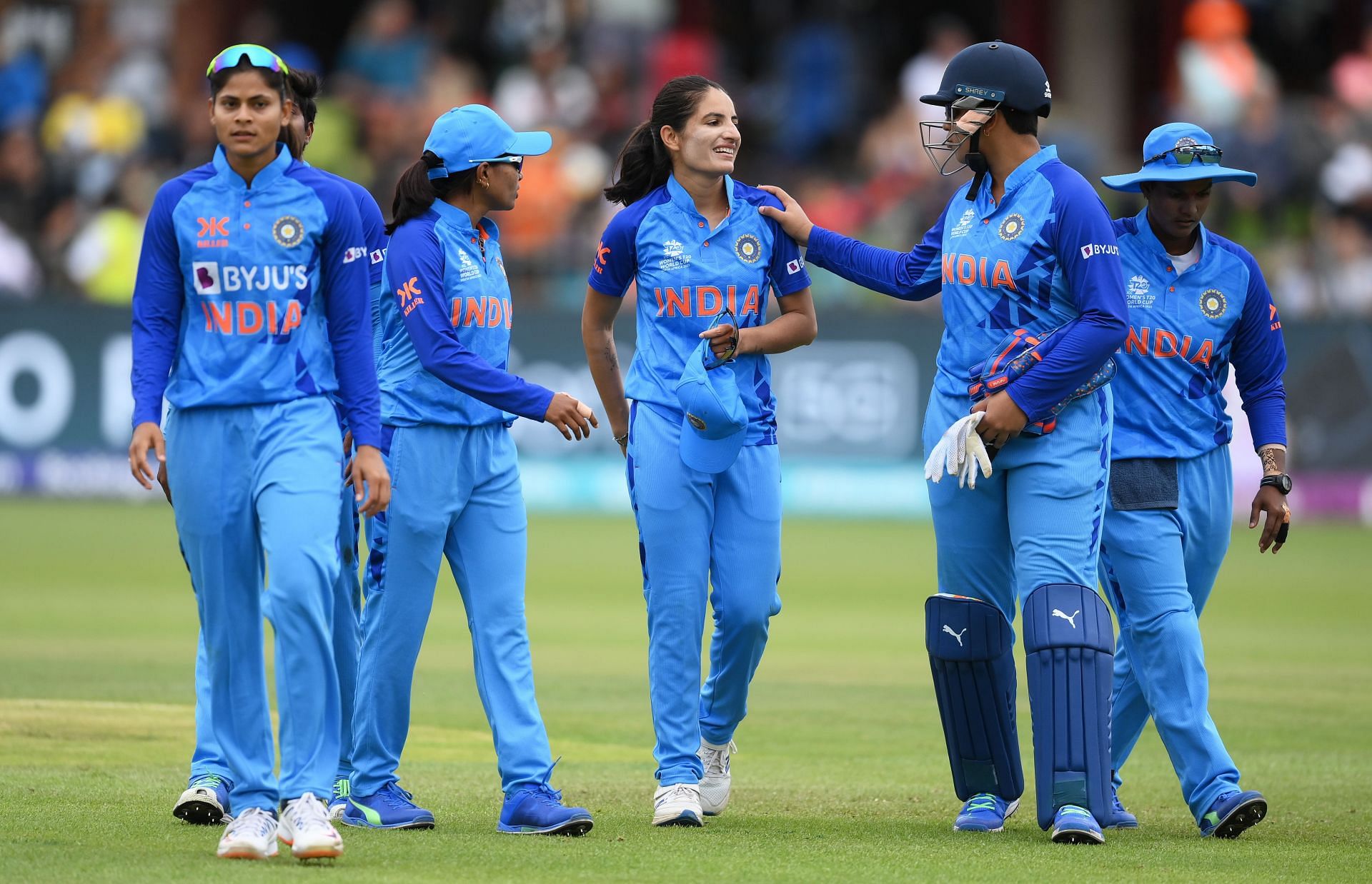 The pacer celebrates a wicket with her teammates. Pic: Getty Images
