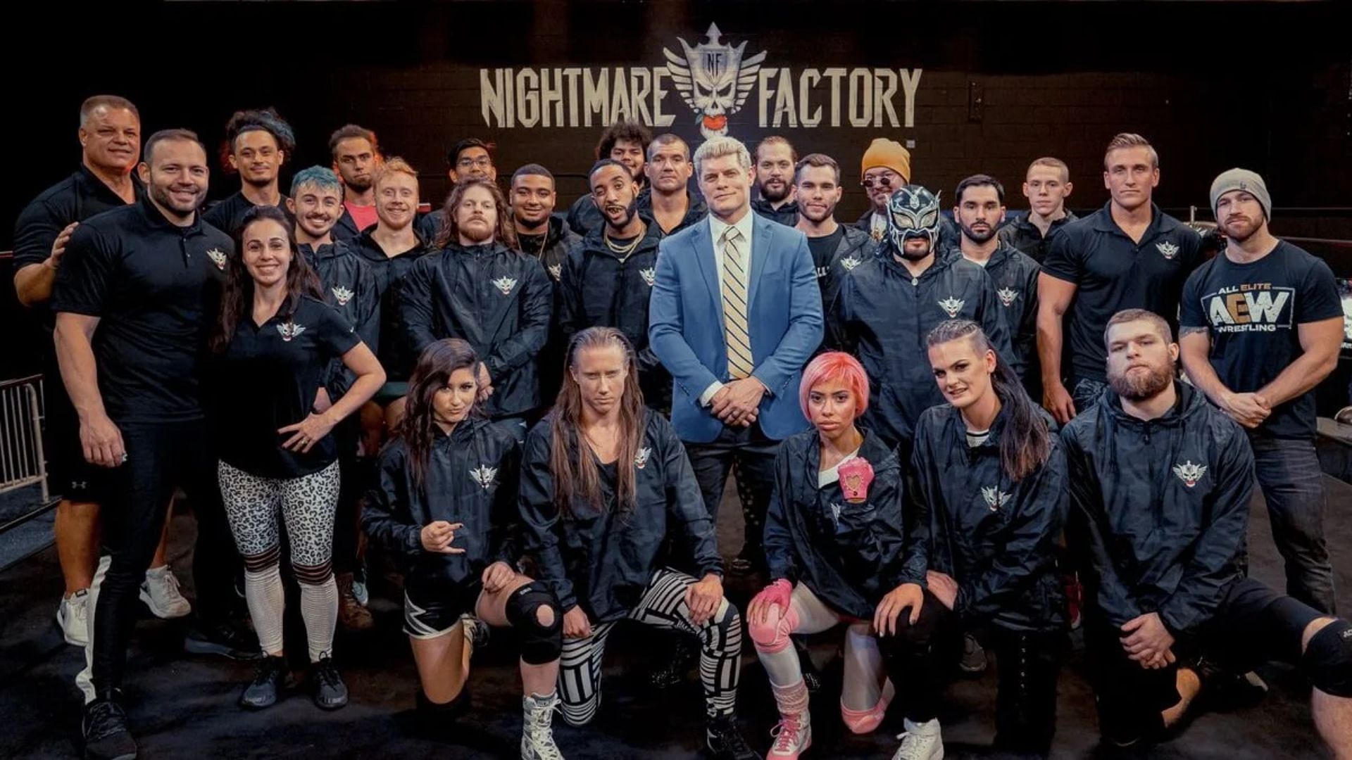 Rhodes and other AEW staff with some students of the Nightmare Factory.