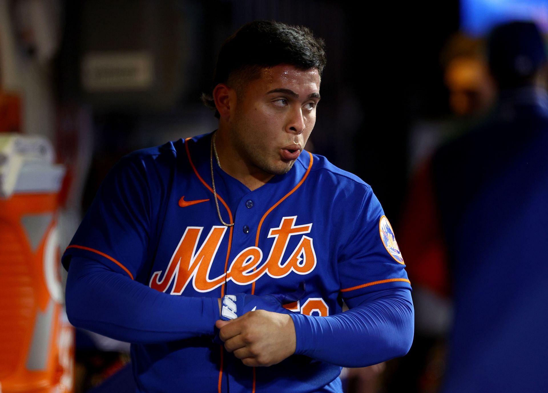 Francisco Alvarez of the New York Mets reacts in the dugout after hitting a home run.