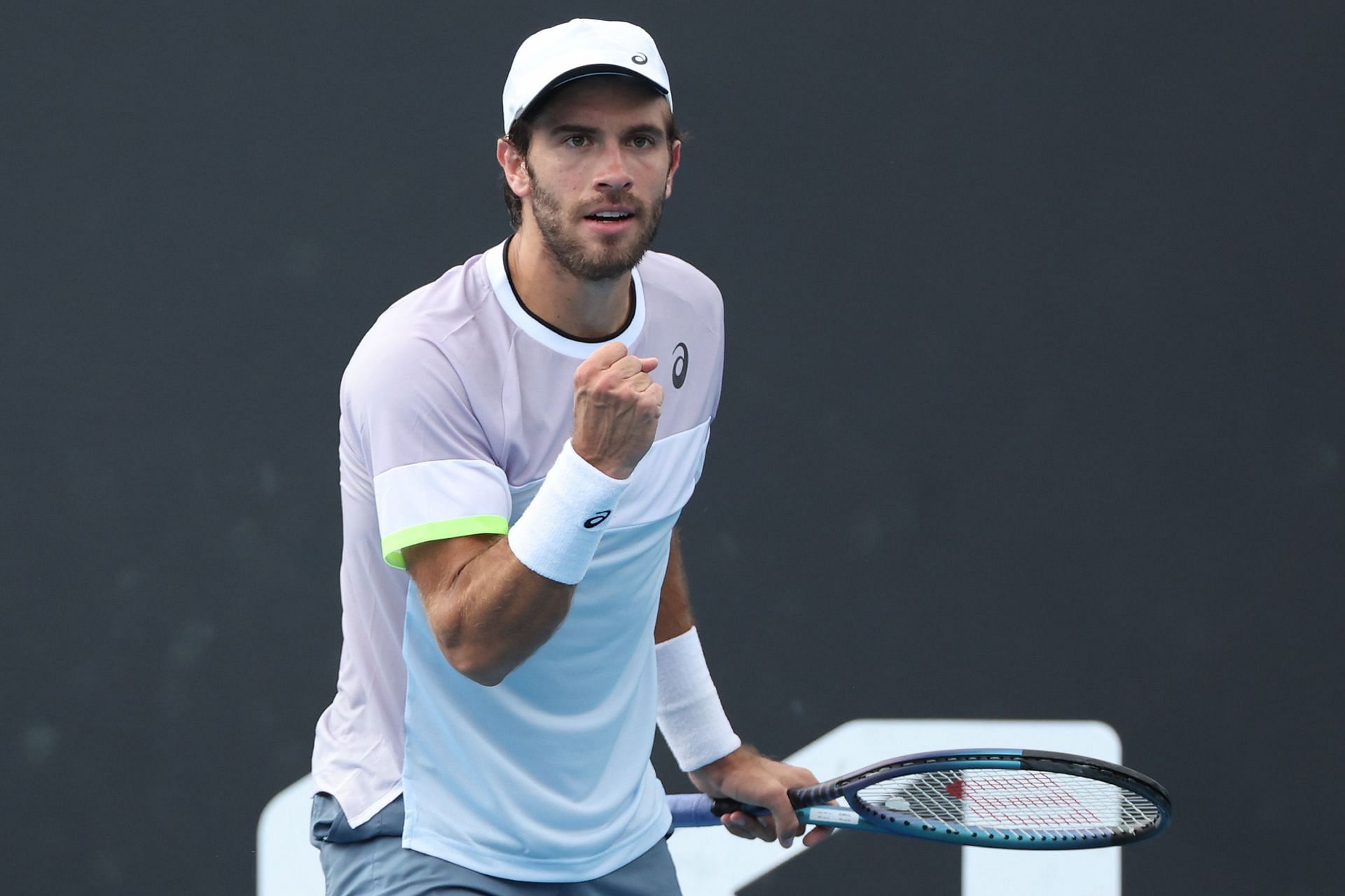 Coric fistpumps during his first-round match at the 2023 Australian Open