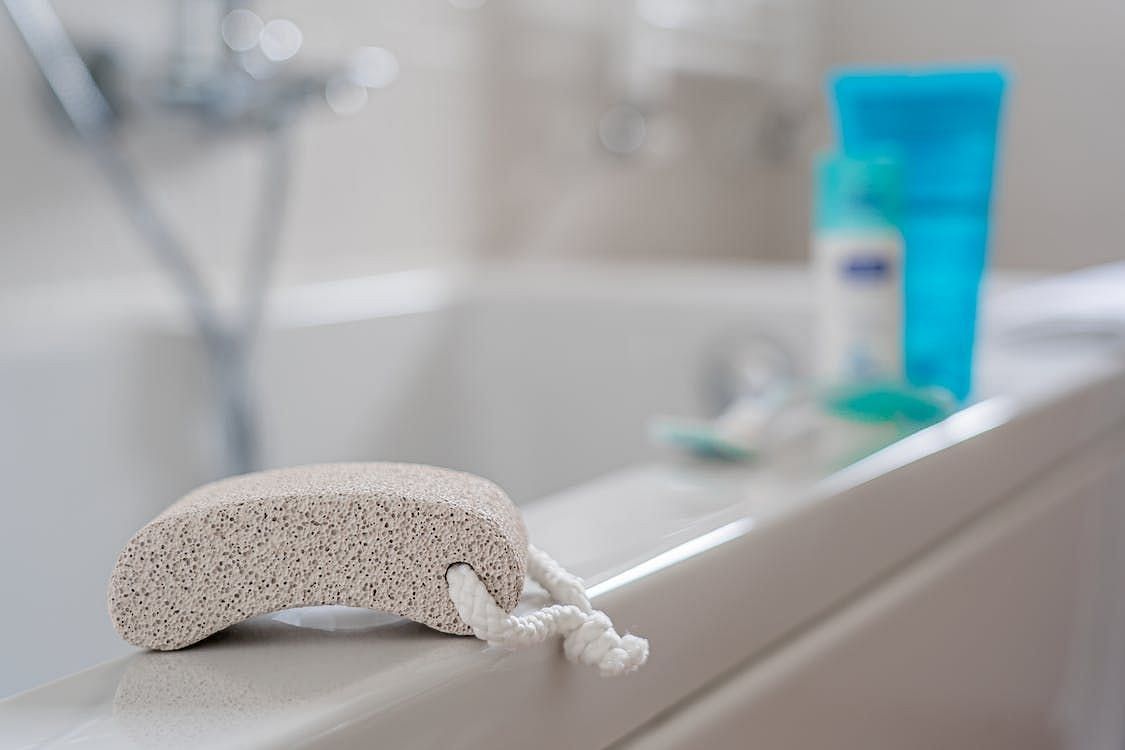 Pumice stone to remove dead skin cells. (Image via Pexels/Castorly Stock)