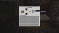 Smelting ancient debris to get netherite scrap (Image via Mojang)
