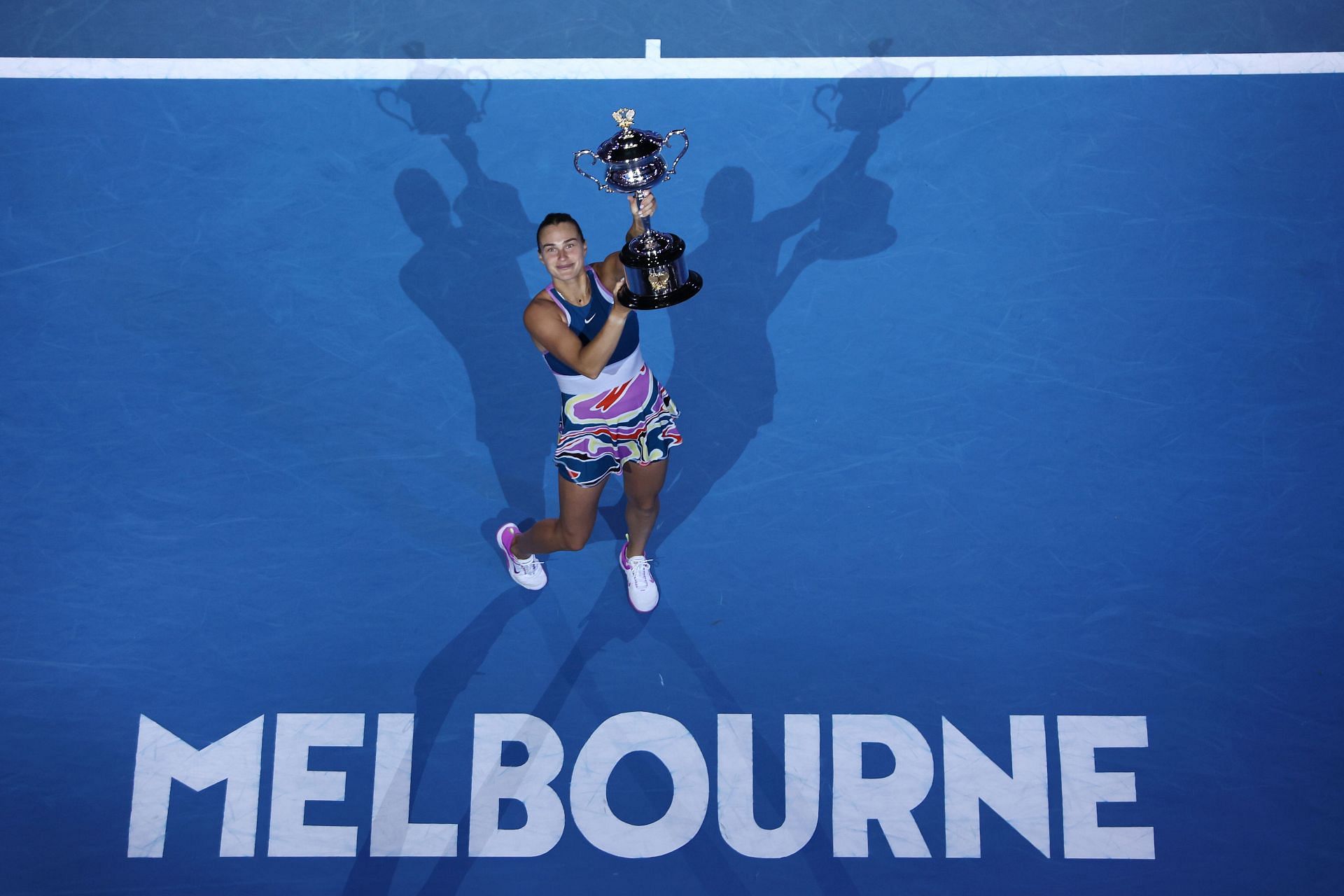 Aryna Sabalenka poses with the 2023 Australian Open trophy.