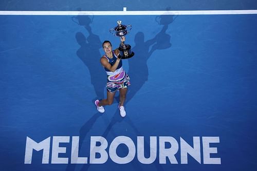 Aryna Sabalenka poses with the 2023 Australian Open trophy.