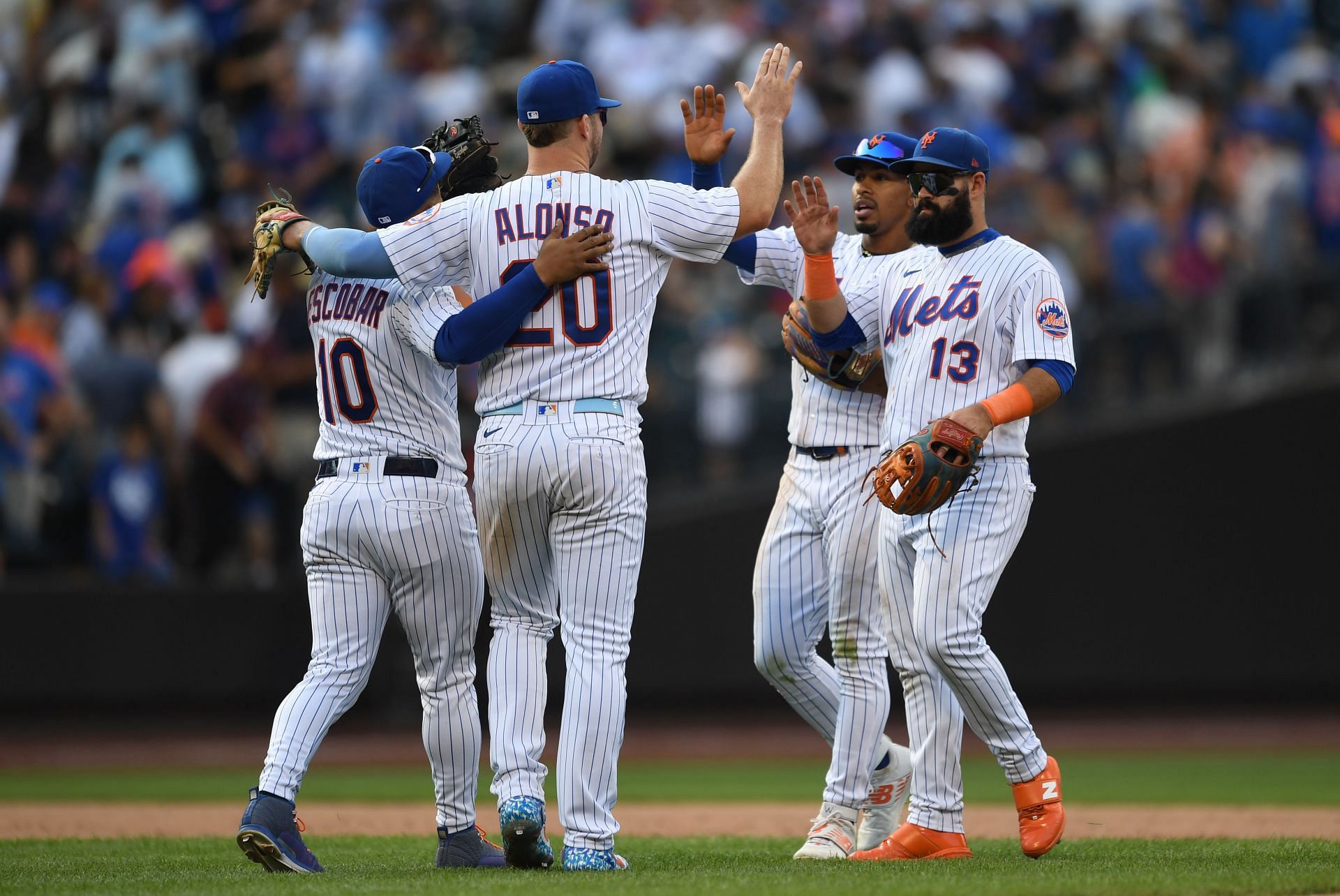 Pete Alonso #20 of the New York Mets celebrates with teammates after defeating the Pittsburgh Pirates at Citi Field on September 18, 2022 in New York City.