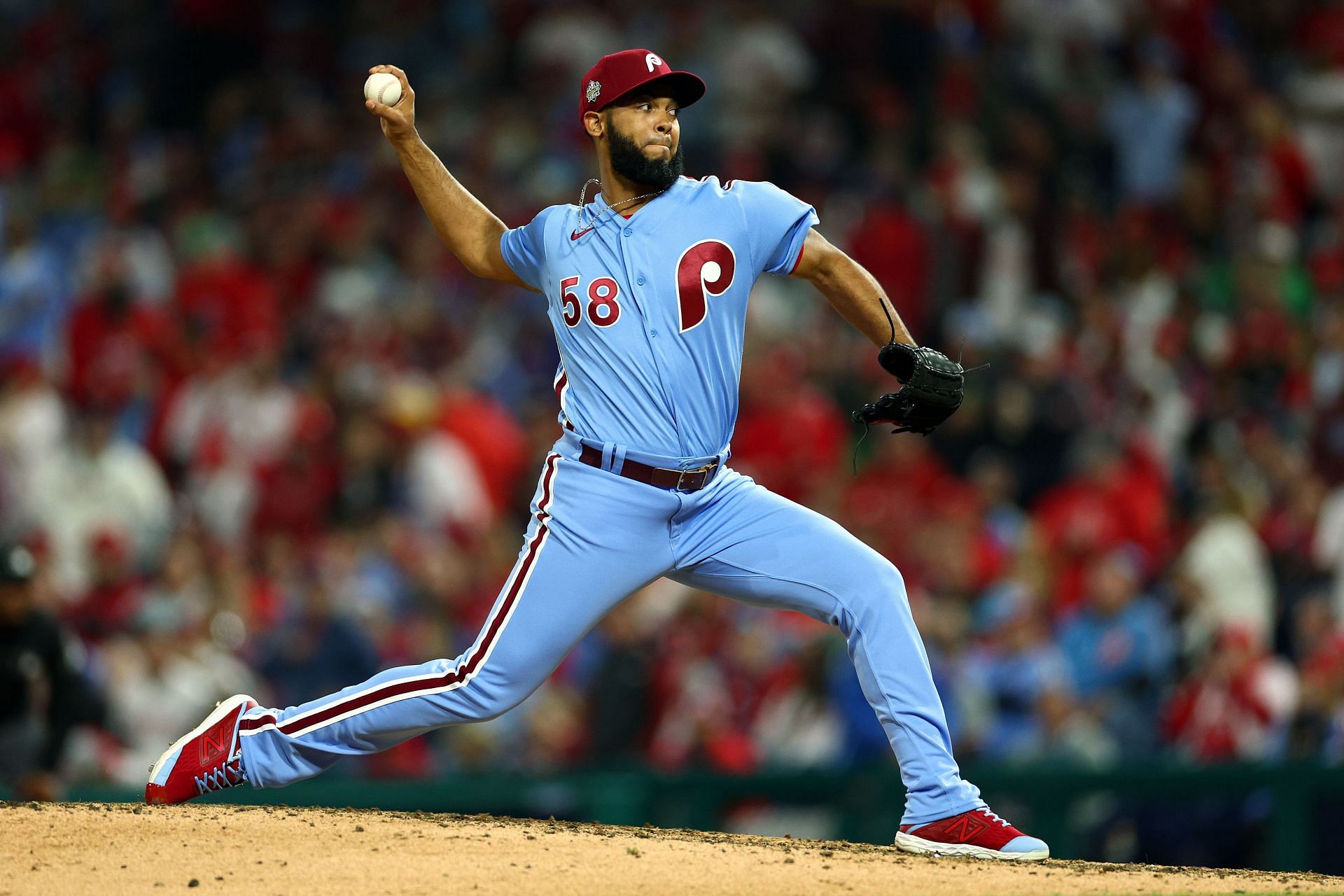Seranthony Dominguez of the Philadelphia Phillies pitches against the San Diego Padres at PETCO Par