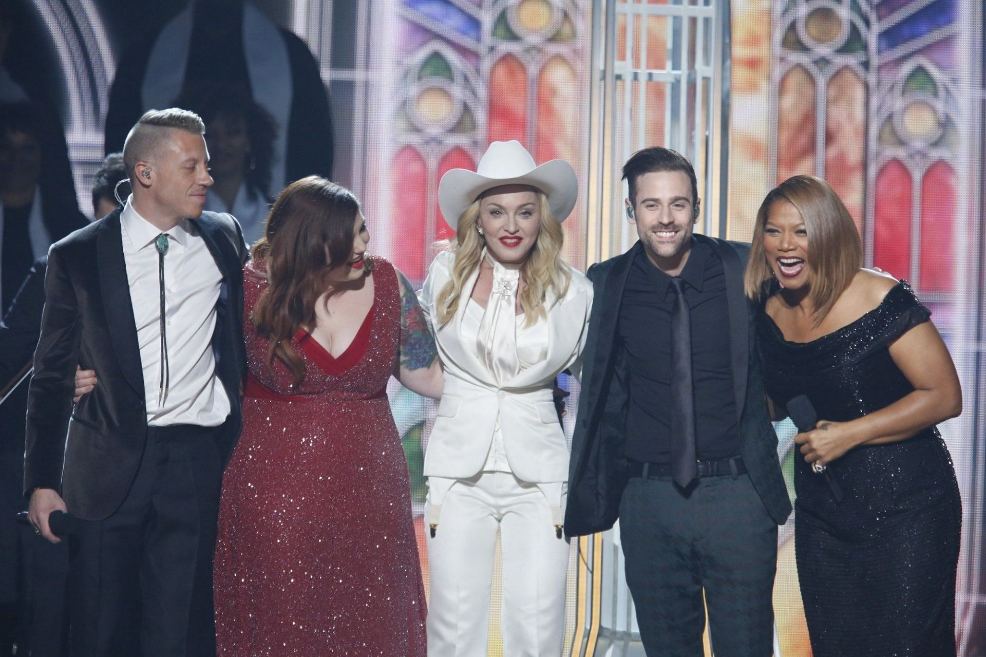 Macklemore, Mary Lamber, Madonna, Ryan Lewis, and Queen Latifah after the performance and nuptials (Image via CBS Archive)