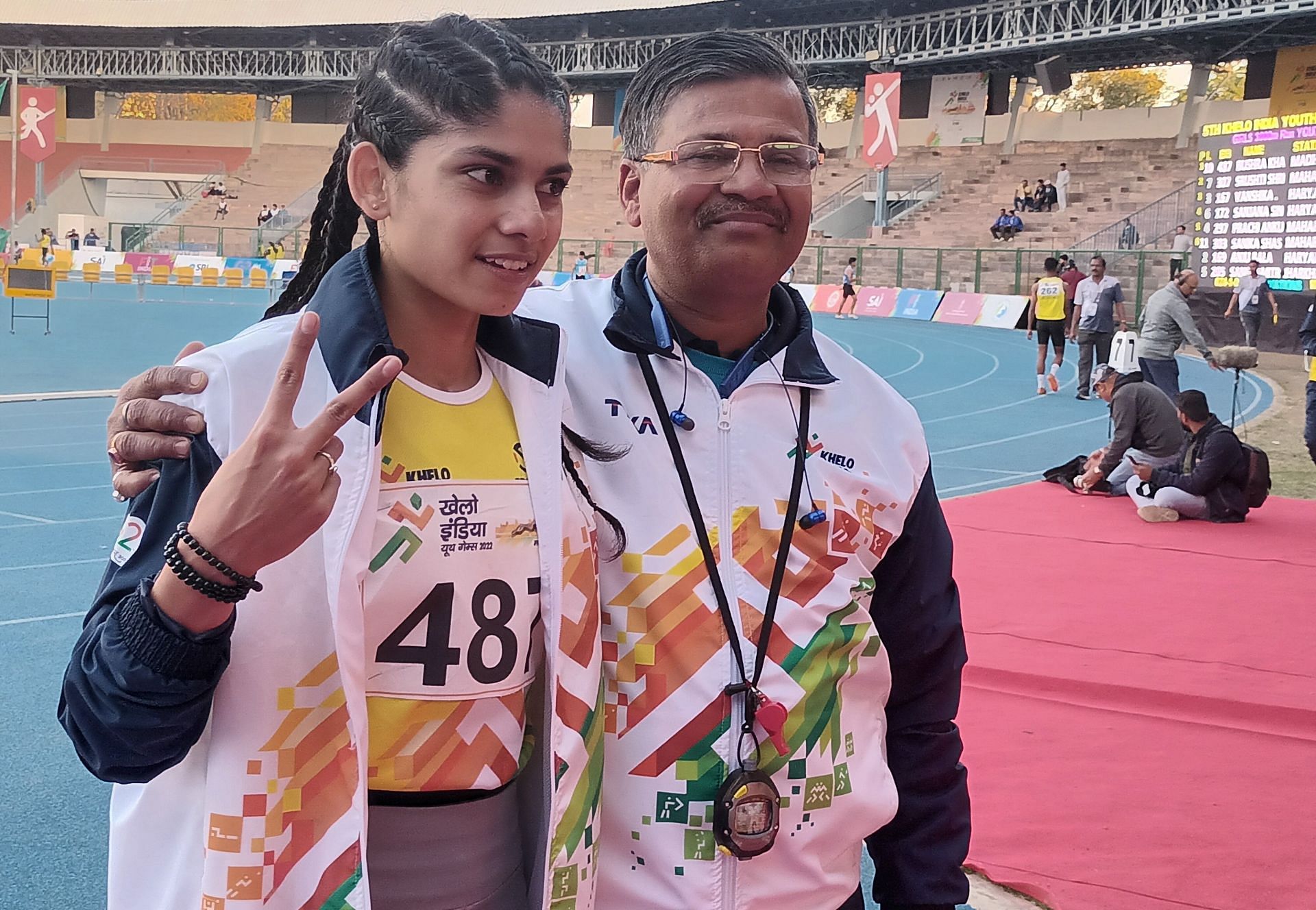 Bushra Khan with her coach SK Prasad. She won gold in the 3000m race at the Khelo India Youth Games in Bhopal on Saturday. Photo credit Navneet Singh