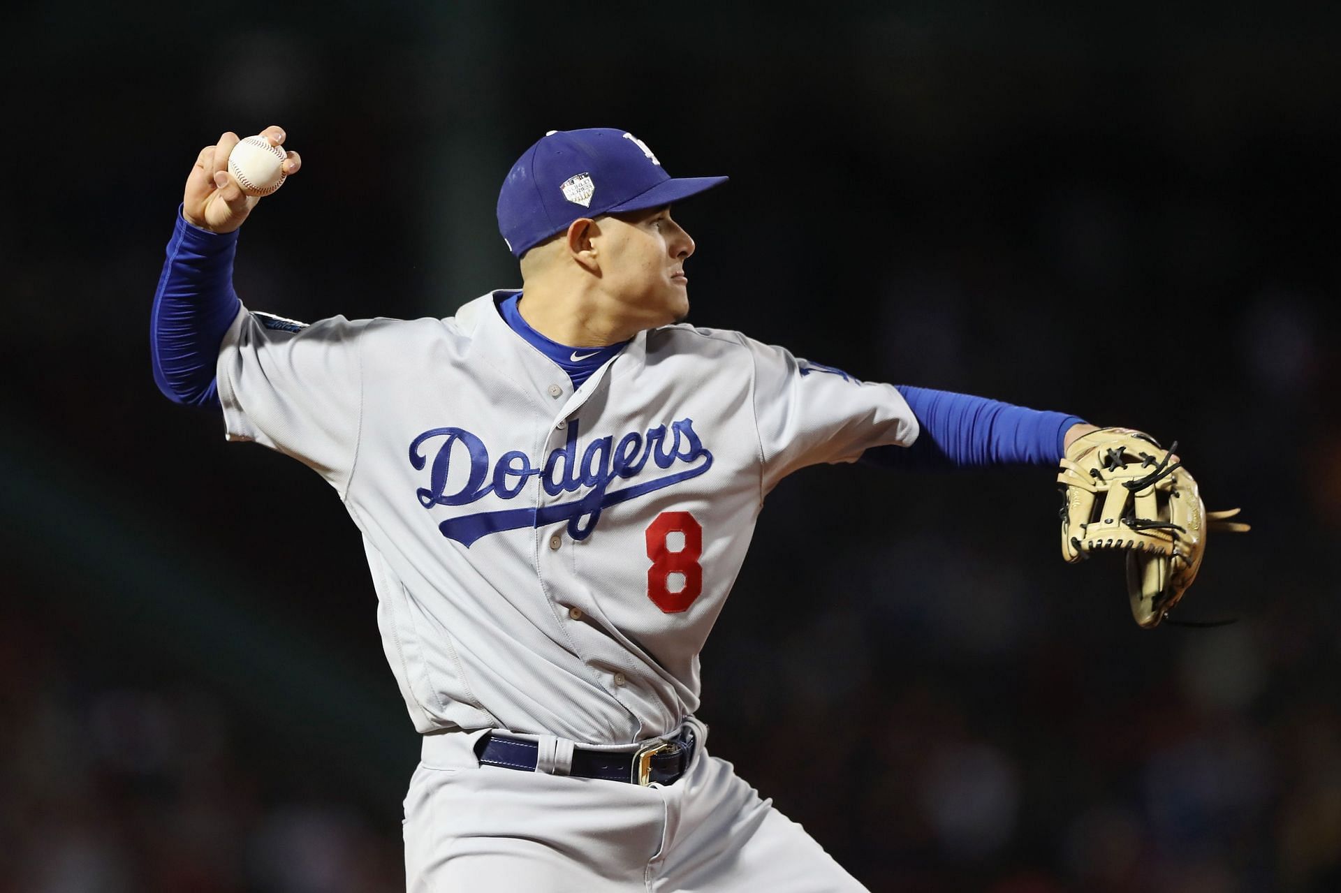 Manny Machado, #8 of the Los Angeles Dodgers, throws out J.D. Martinez during the 2018 World Series