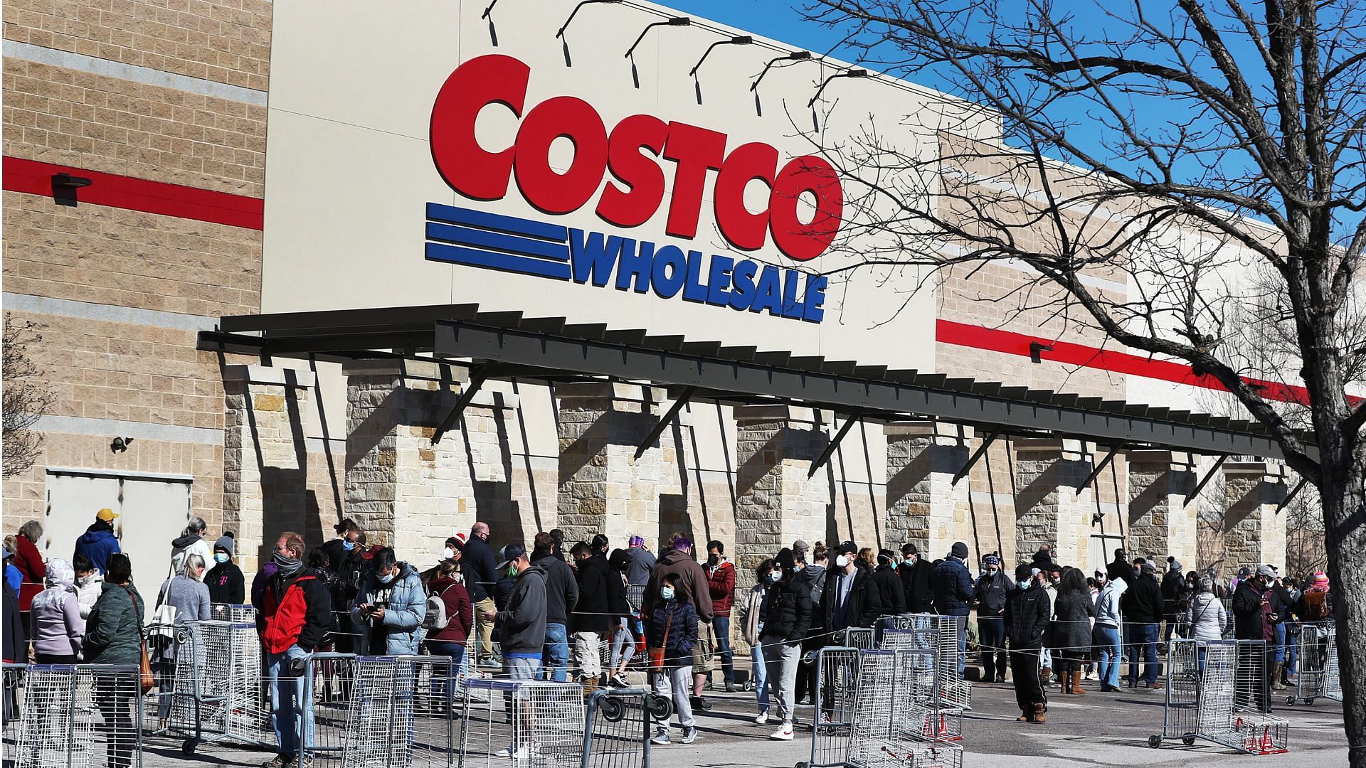 Customers are paying high prices at Costco (Image via Joe Raedle/Getty Images)