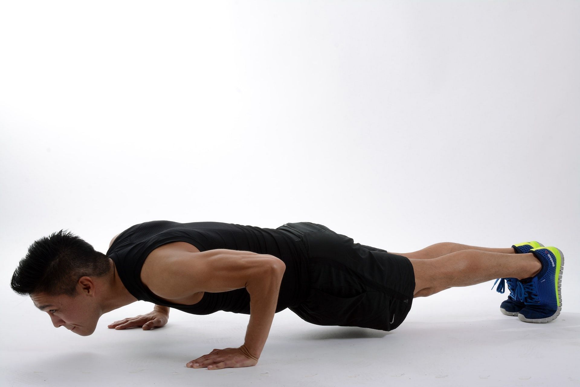 Push-ups are one of the best toned arms workouts. (Photo via Pexels/Keiji Yoshiki)