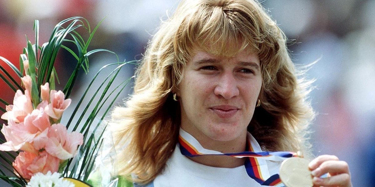 Steffi Graf pictured with her Olympic medal.