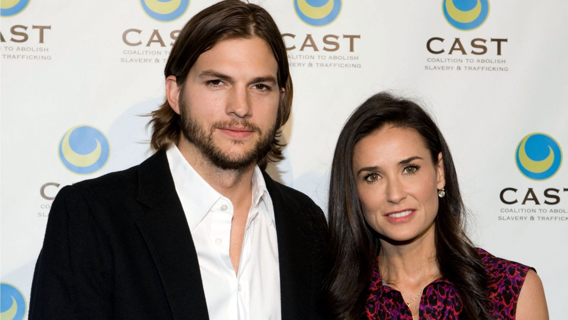 Ashton Kutcher and Demi Moore. (Photo via Amanda Edwards/Getty Images)