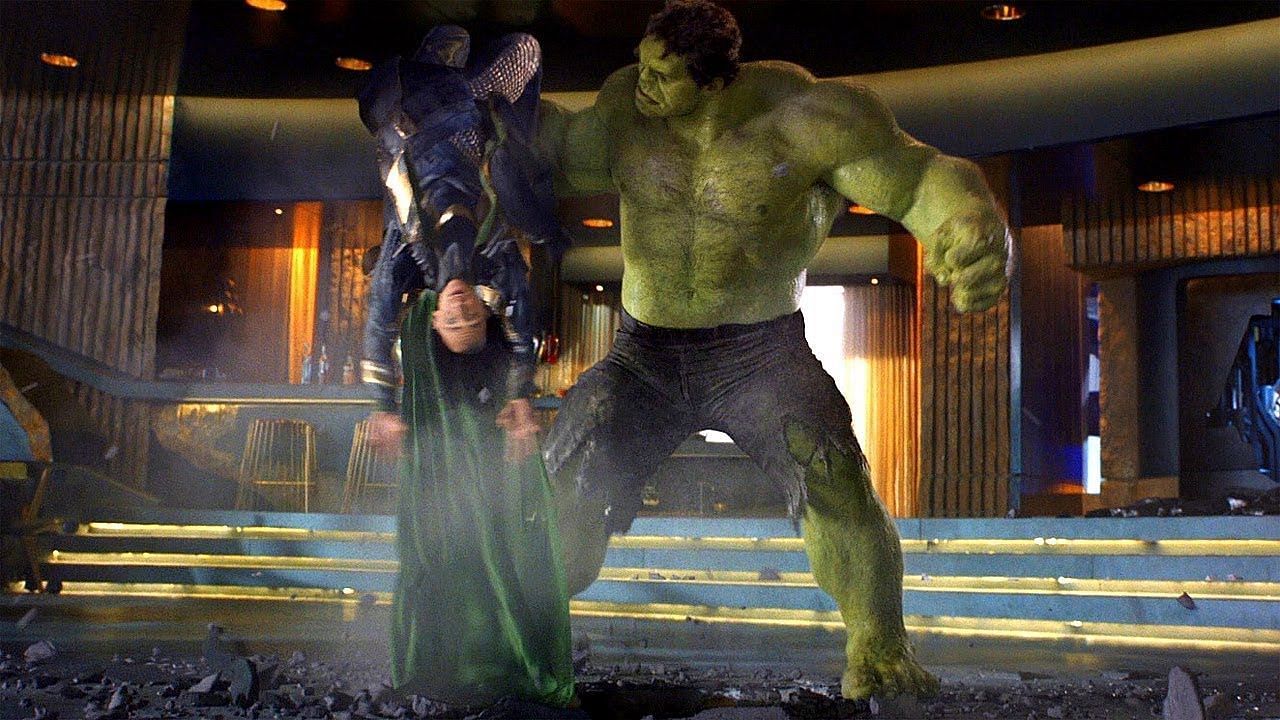 Hulk punishes Loki for his arrogance by slamming him repeatedly onto the ground like a ragdoll (Image via Marvel Studios)