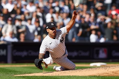 Nestor Cortes #65 of the New York Yankees throws out Myles Straw #7 of the Cleveland Guardians at first base during the fourth inning in game two of the American League Division Series at Yankee Stadium on October 14, 2022 in New York, New York.