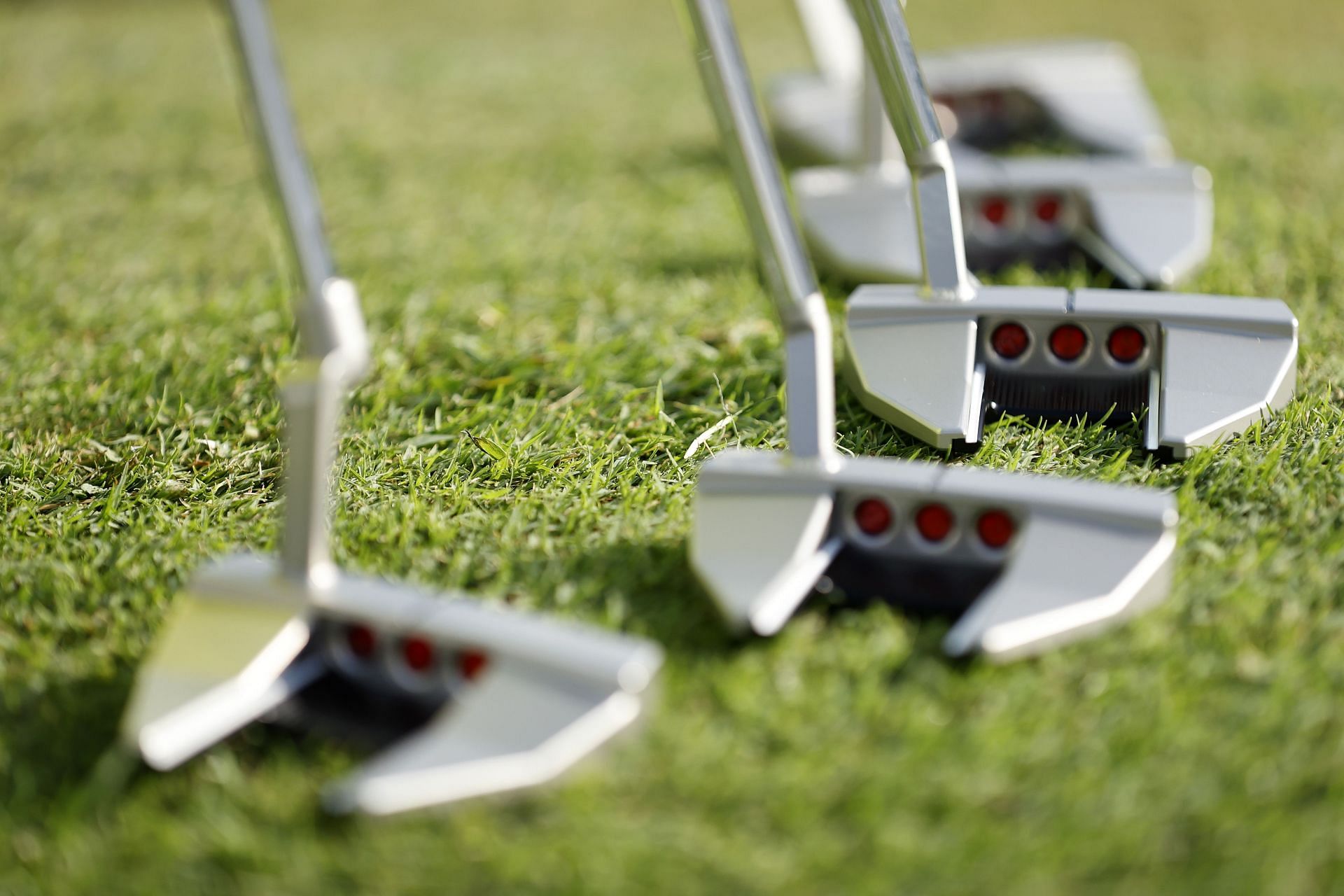 Scotty Cameron putters (Image via Cliff Hawkins/Getty Images)