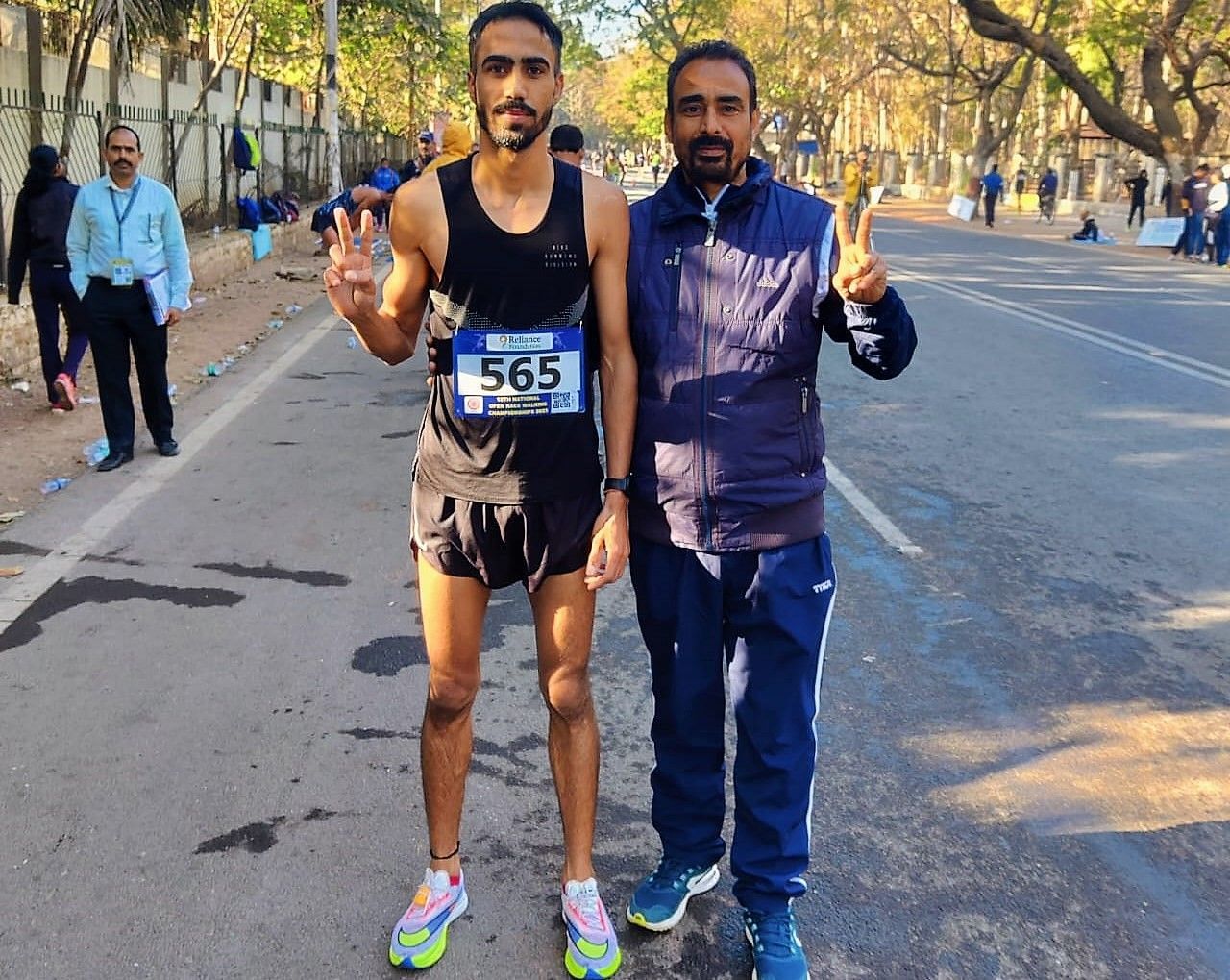 Akshdeep Singh with his former coach Gurdev Singh after setting national record in men&rsquo;s 20km race walk event in Ranchi on Tuesday. Photo credit Gurdev Singh