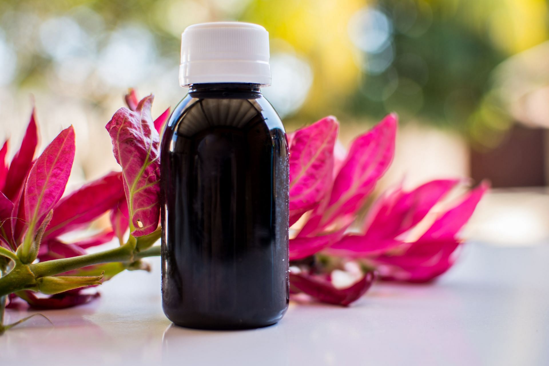 Black castor oil has a completely unique extraction process that makes it black (Image via Unsplash @Thaismara Figueredo)