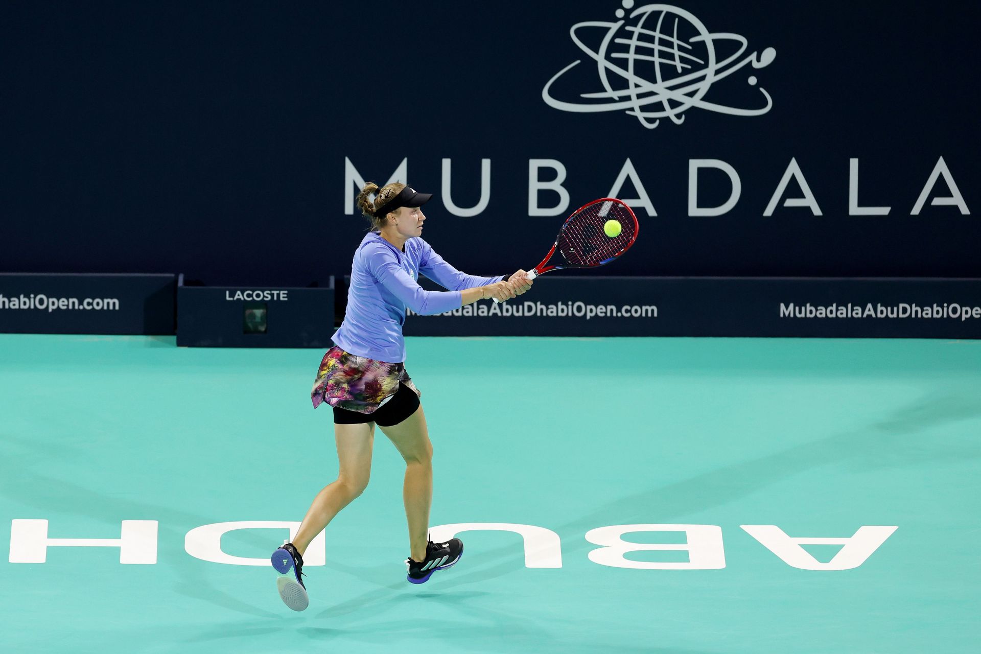 Rybakina strikes the ball at the Mubadala Abu Dhabi Open