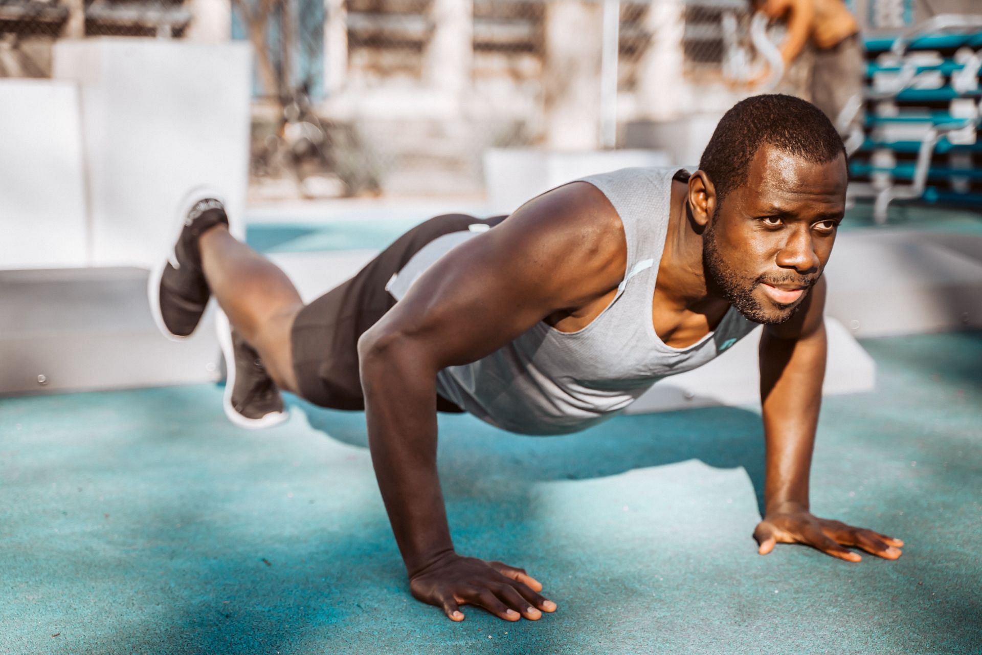 Push ups are a great push day workout to add to your routine! (Image via unsplash/Fortune Vieyra)