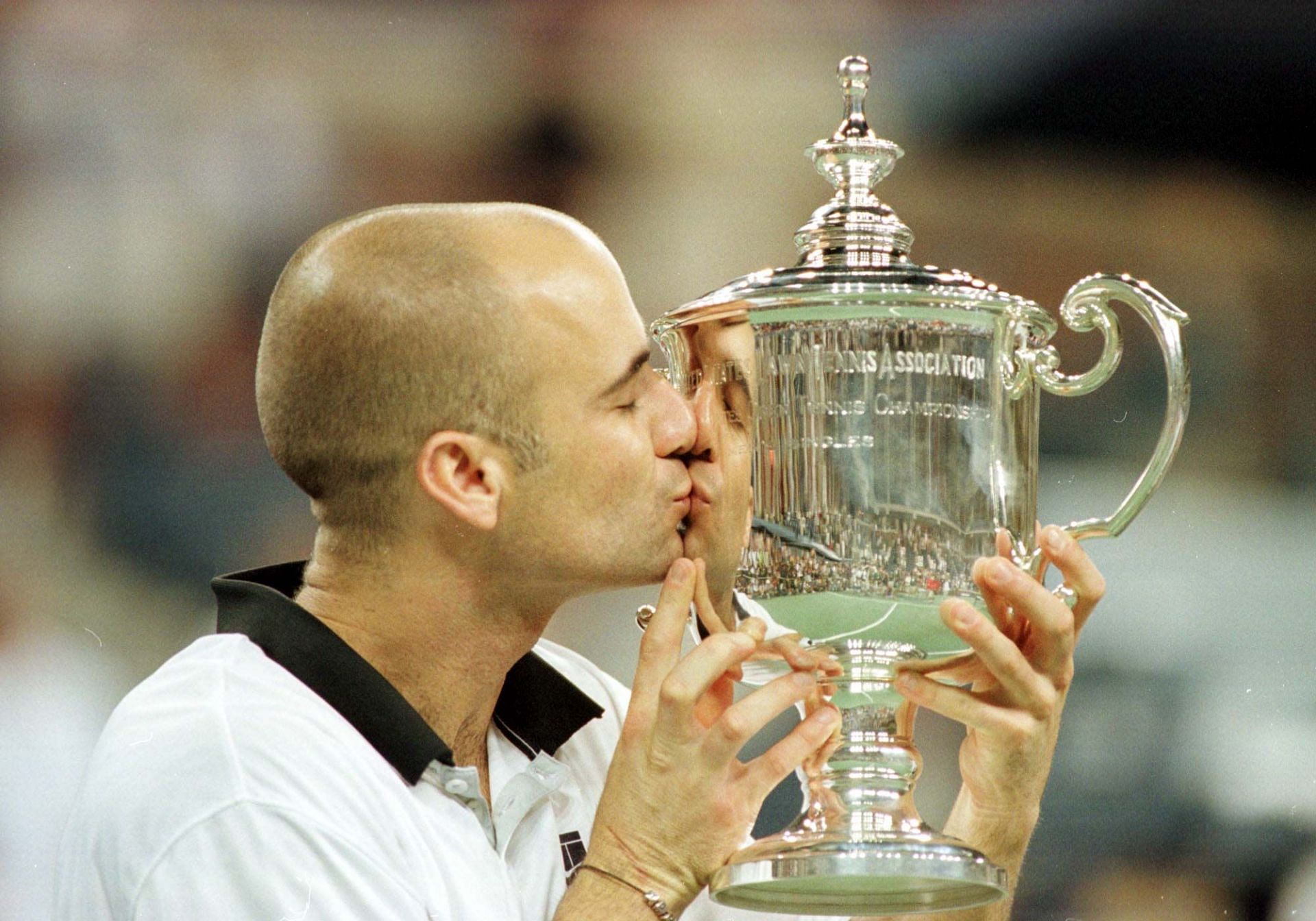 Andre Agassi with his 1999 US Open trophy