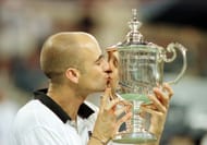 Andre Agassi with his 1999 US Open trophy