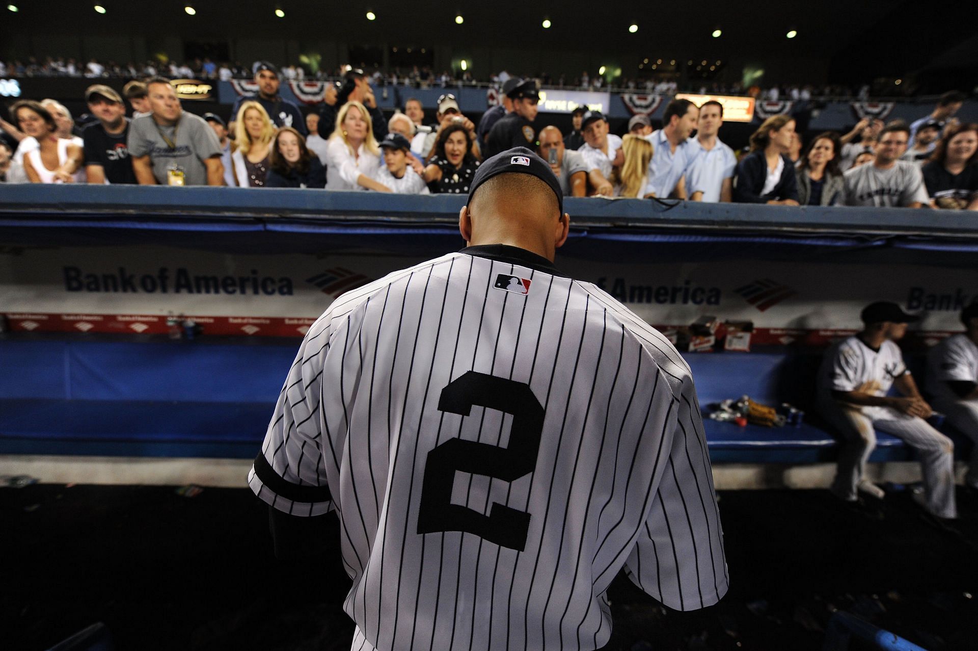Derek Jeter #2 of the New York Yankees signs autographs for fans after winning the last regular season game at Yankee Stadium 7-3 against the Baltimore Orioles on September 21, 2008 in the Bronx borough of New York City. The Yankees are playing their final season in the 85-year-old ballpark and plan on moving into the new Yankee Stadium across the street to start the 09 season.