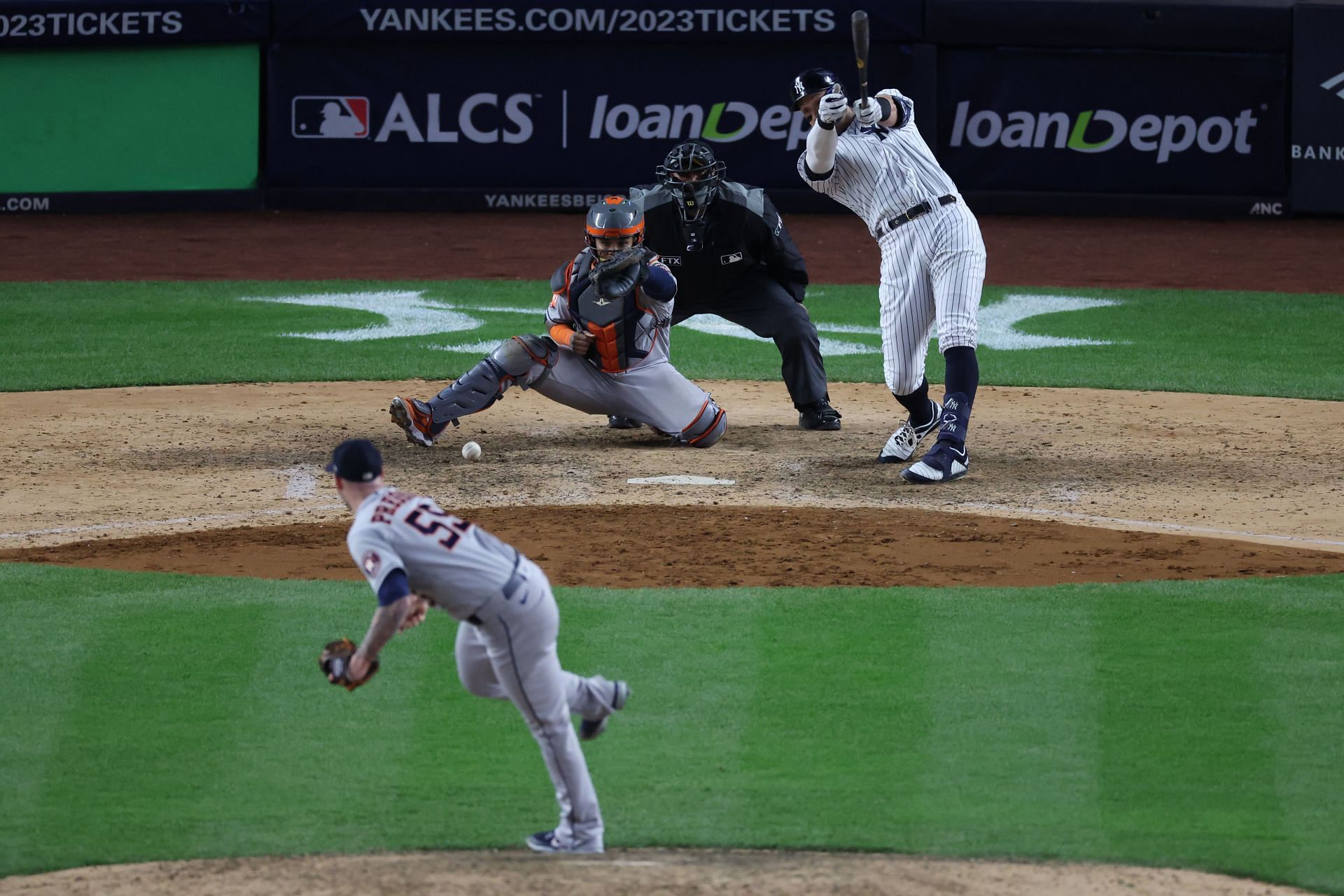 Aaron Judge of the New York Yankees hits the ball for the final out in game four of the American League Championship Series against the Houston Astros.