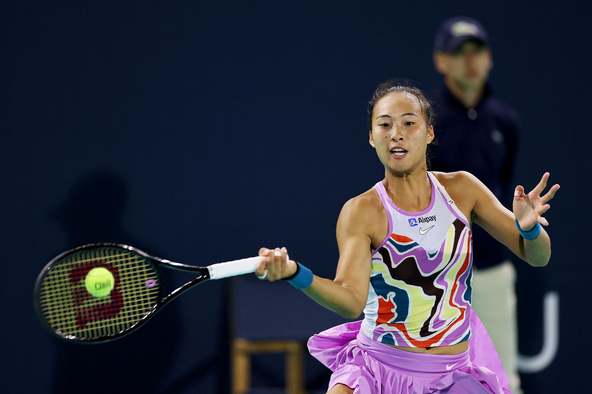 Qinwen Zheng in action at the Mubadala Abu Dhabi Open.