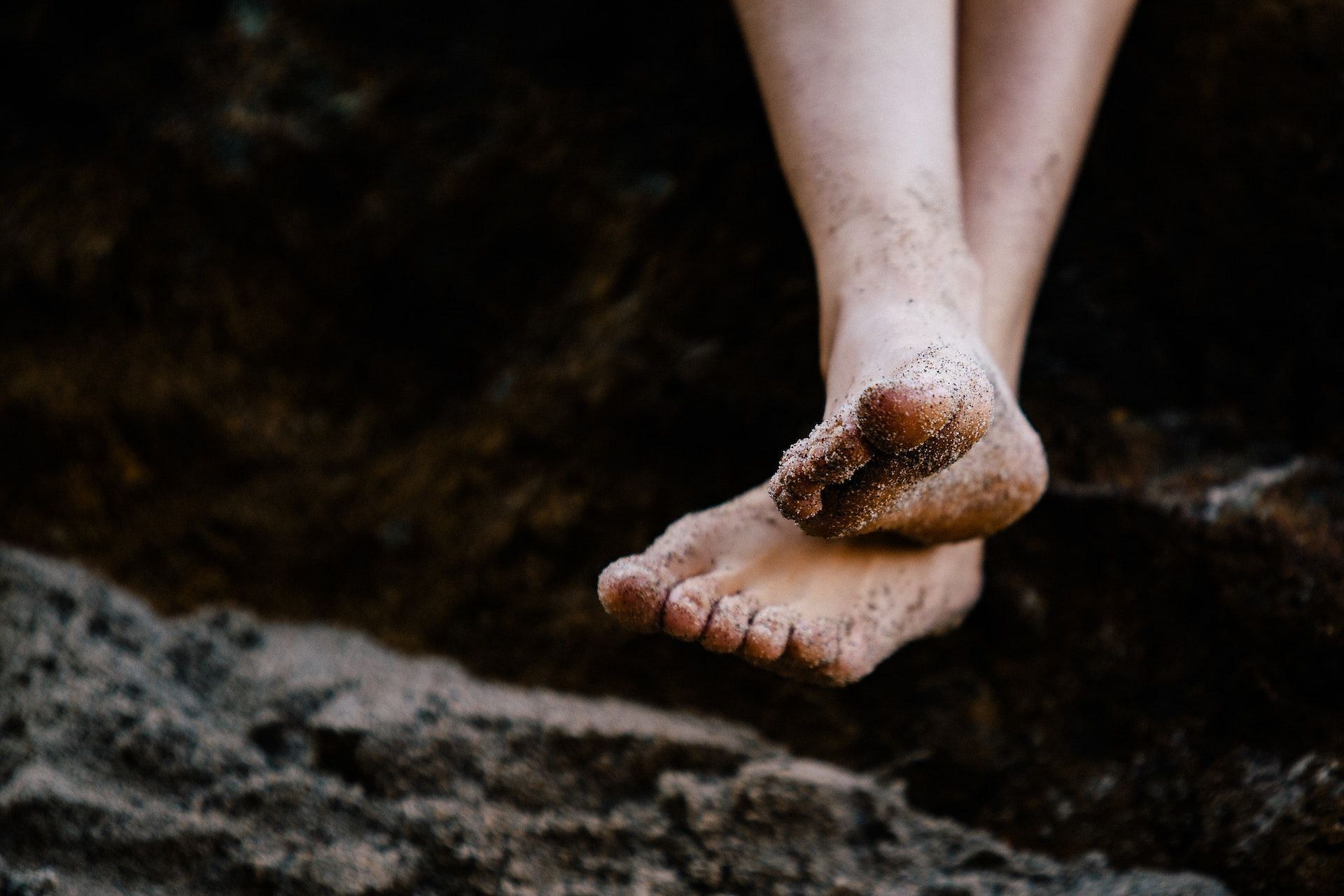 Walking barefoot can cause cracked heels. (Photo via Pexels/Isaac Taylor)