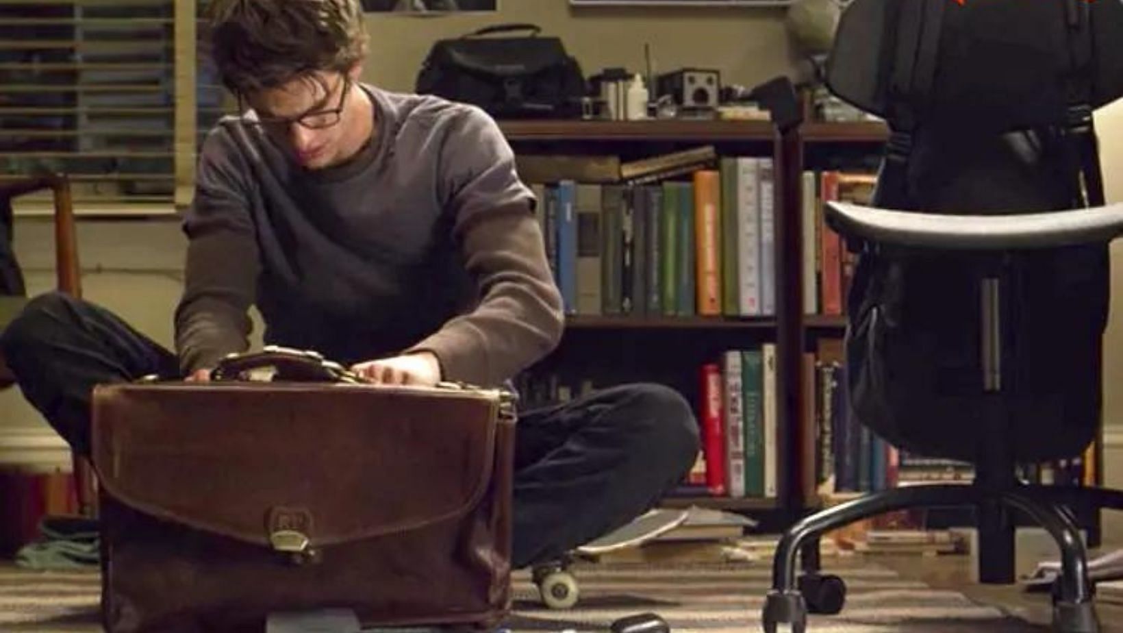 Peter discovers a hidden bag (Image via Sony Pictures)