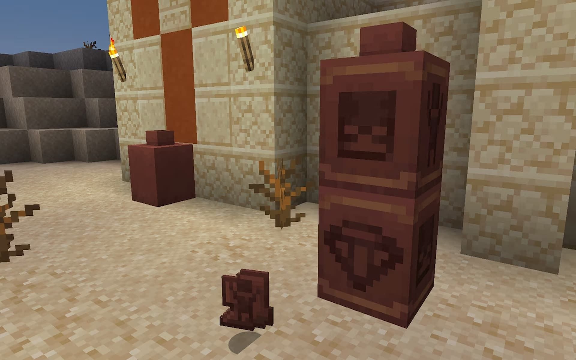 Players can use the brush tool to locate treasures, including pottery shards (Image via Mojang)