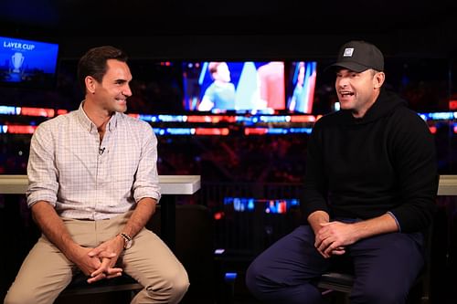 Andy Roddick speaks with Roger Federer during the Laver Cup 2021.