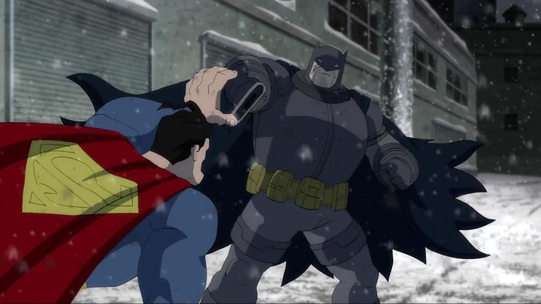 The Dark Knight Returns: Batman standing over a defeated Man of Tomorrow with his kryptonite-powered exoskeleton (Image via DC Animation)