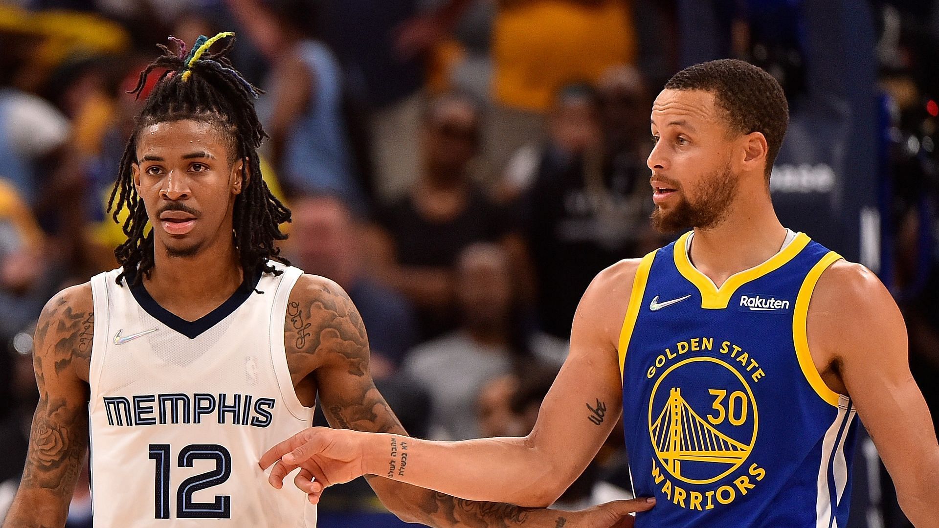 Steph Curry of the Golden State Warriors along with Ja Morant of the Memphis Grizzlies