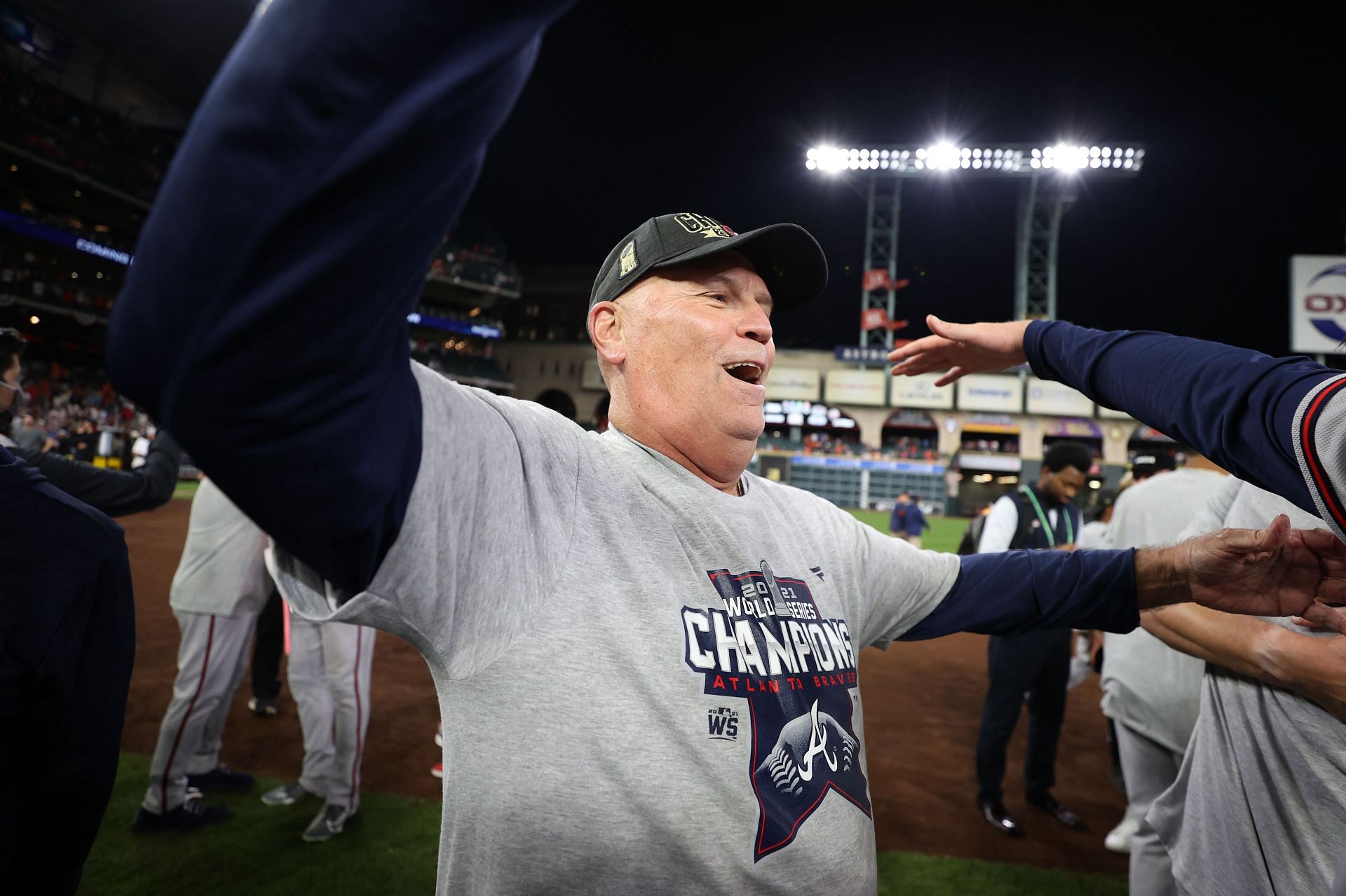 Manager Brian Snitker celebrates winning the 2021 World Series at Minute Maid Park
