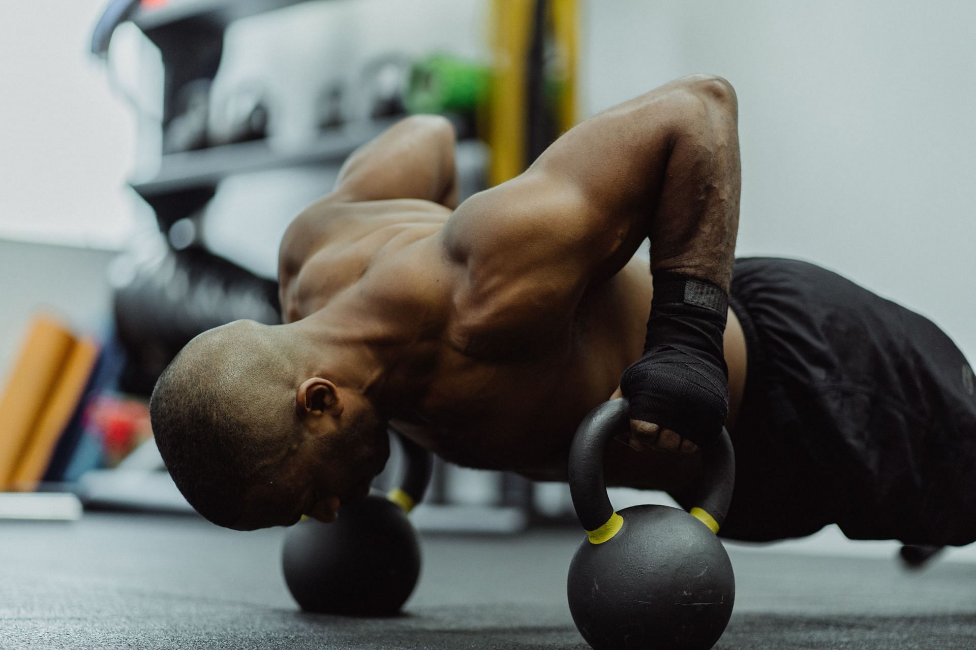 Push-ups are a great option to include in at-home workout for biceps. (Image via Pexels/Ketut Subiyanto)